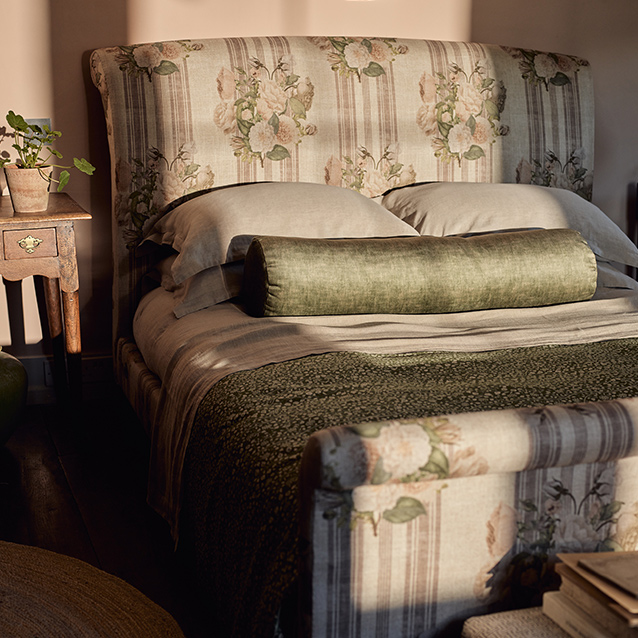Arles King Bed in RHS Etta's Bouquet Alba Truffle with Bolster in Almost Plain Velvet Spring
